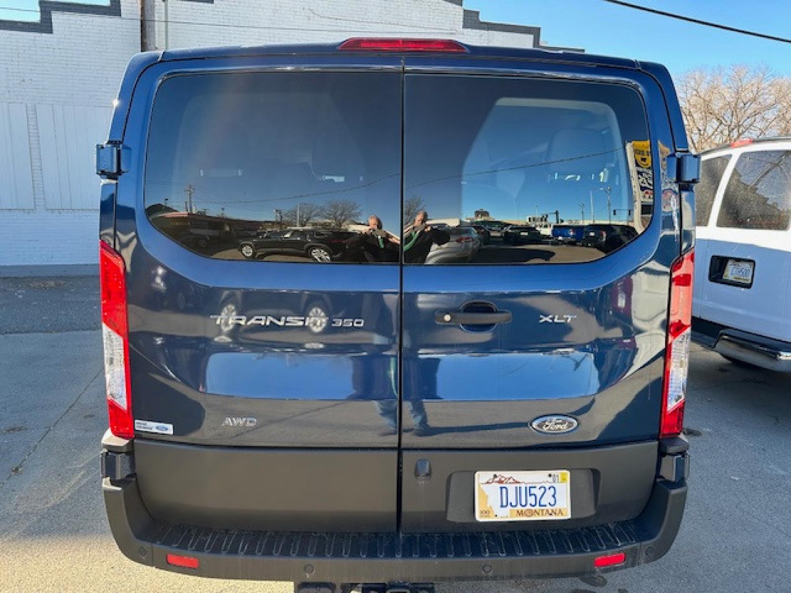 2022 BLUE /Charcoal Gray Ford Transit (1FBAX9Y8XNK) with an 3.5 engine, Automatic transmission, located at 3200 1st Avenue North, Billings, MT, 59101, (406) 245-9055, 45.779270, -108.510742 - This is One of Our 15 Passenger Vans Available for Sale or Rent. Dual Power Seats, Tilt Steering, Cruise Control, Front & Rear Air Conditioning, Power Windows, Power Door Locks, Privacy Glass, Extended Fuel Capacity, Tow Package, All Wheel Drive and Much More! CarFax Dealer Auto Brokers of Monta - Photo #3